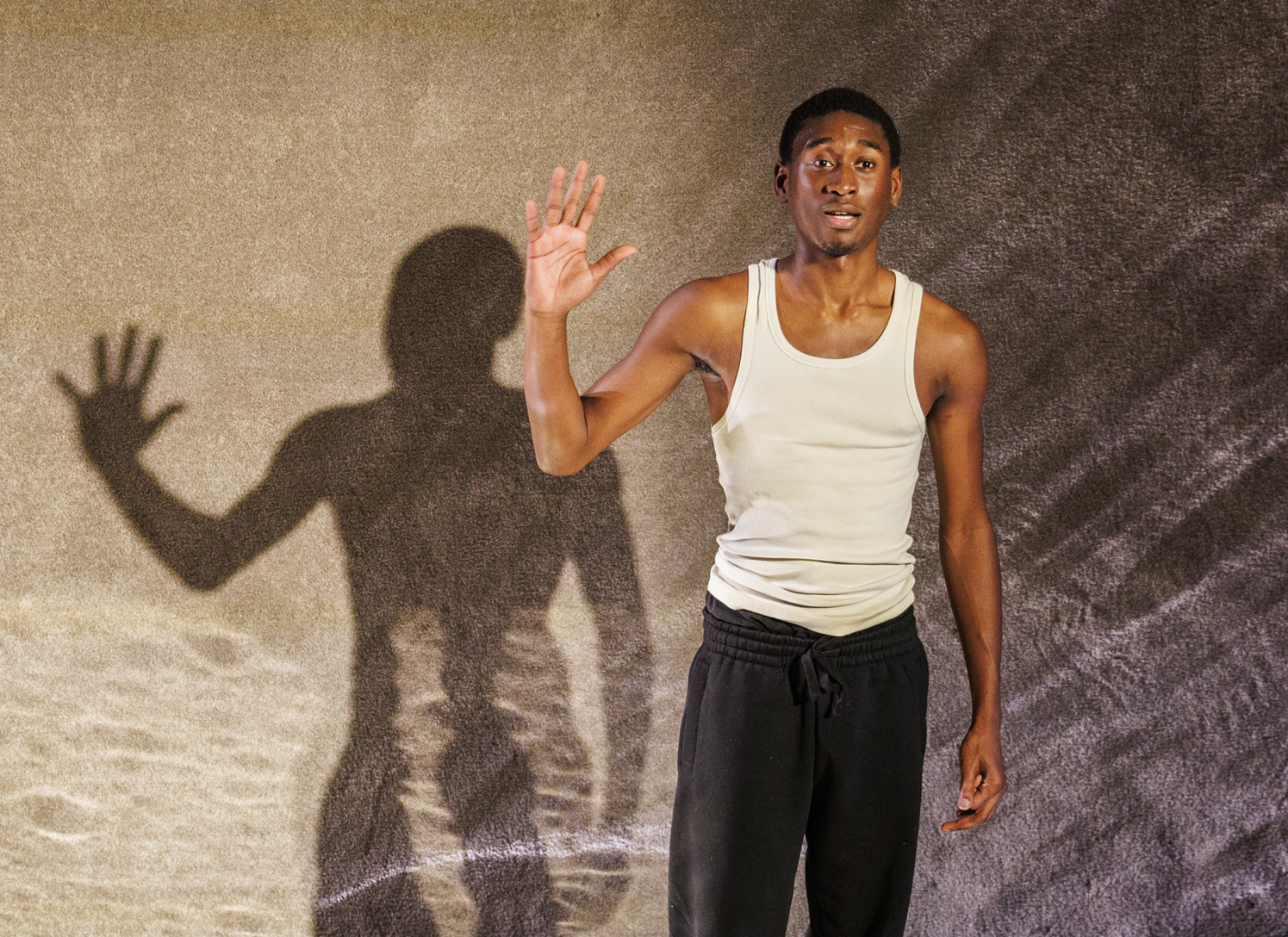 Tienne Simon as Malachi in Dreaming and Drowning