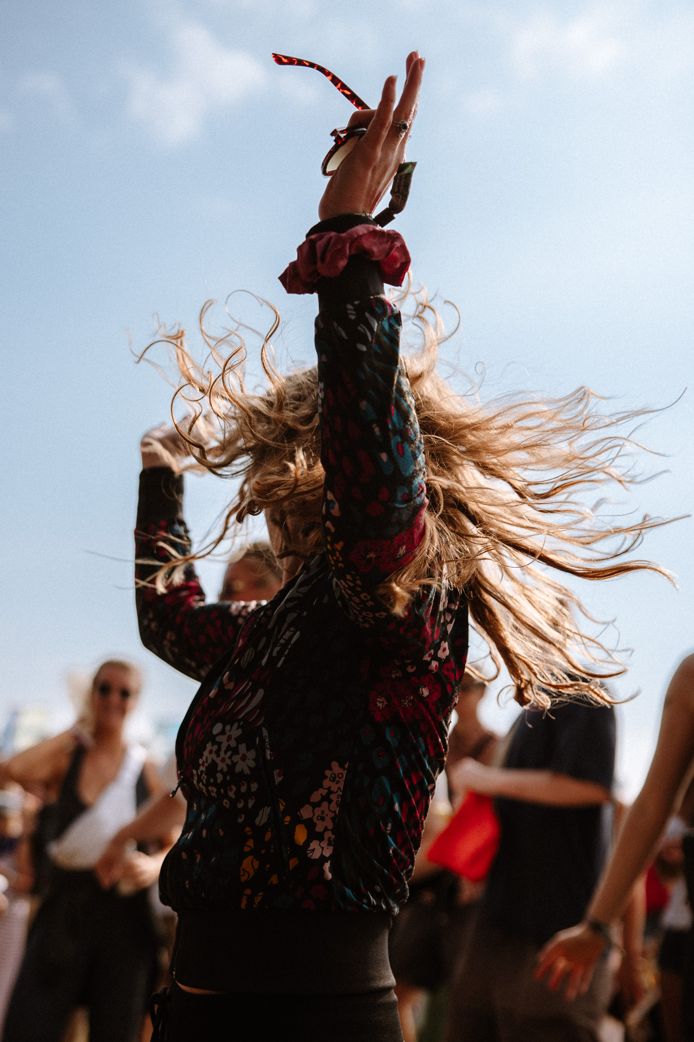 A reveller dancing at Wilderness Festival